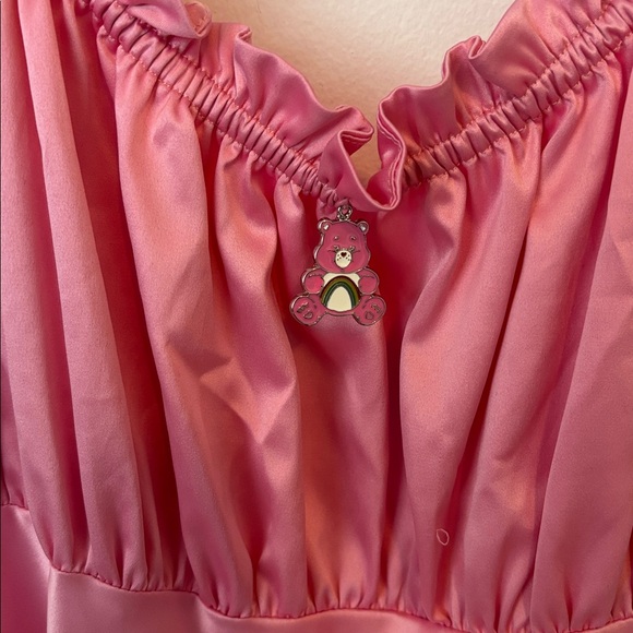 HERE TO CHEER MINI DRESS
DOLLS KILL X CARE BEARS - Picture 6 of 6